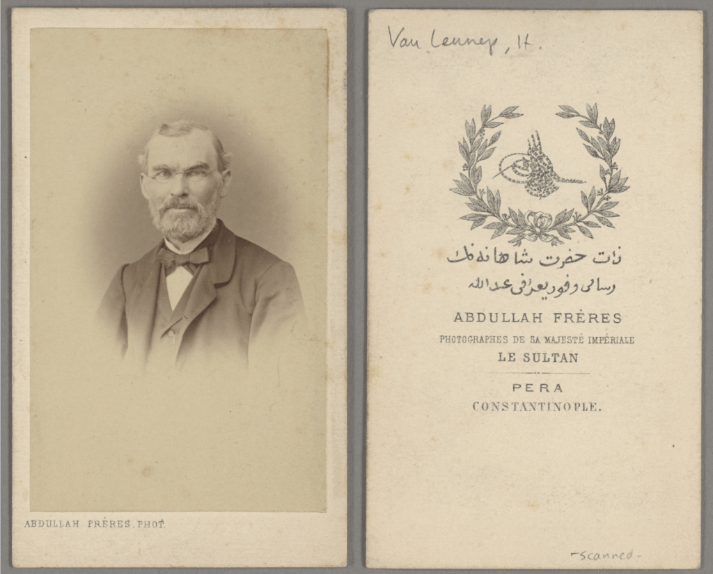 black and white portrait photograph front and back with photographer's insignia on the back